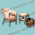 Rattan chair with small table and magazine basket.