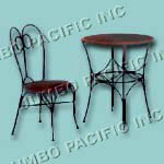 Wrought iron chair and table combination.